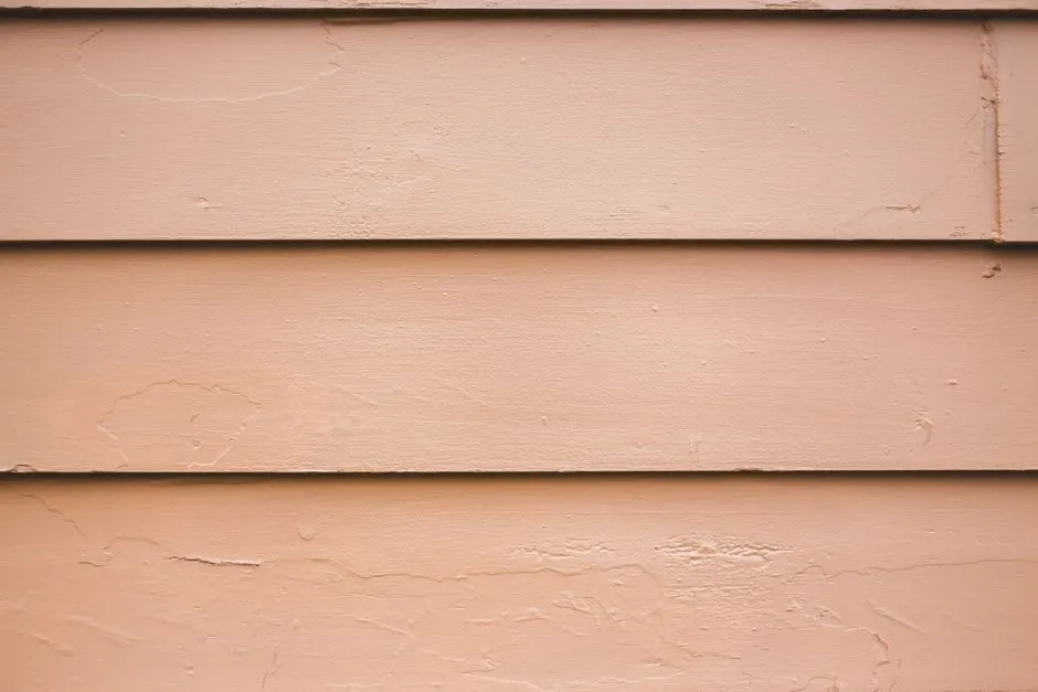 Close-up of a textured wooden wall panel perfect for background or texture use.